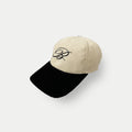 Embroidered Two toned Corduroy Cap in Script Print